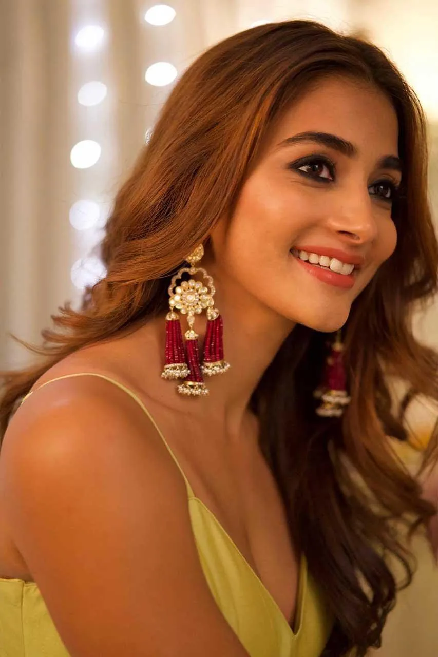 Pooja Hegde in Yellow Dress with Statement Earrings and Smile