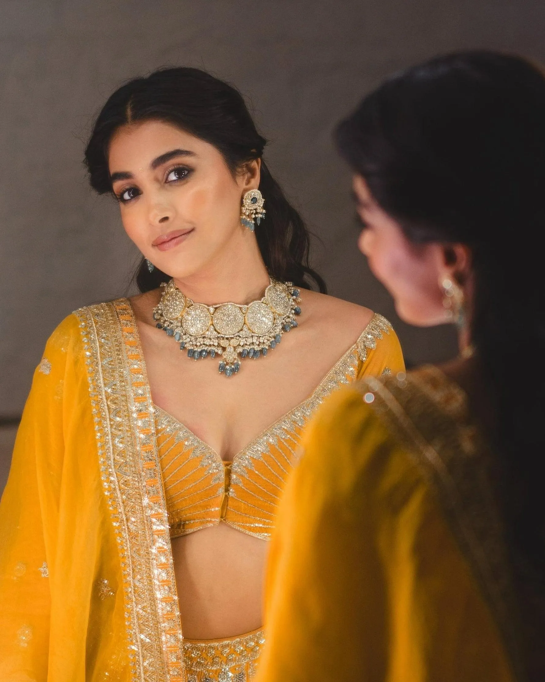 Pooja Hegde in Yellow Lehenga Taking Selfie in Mirror