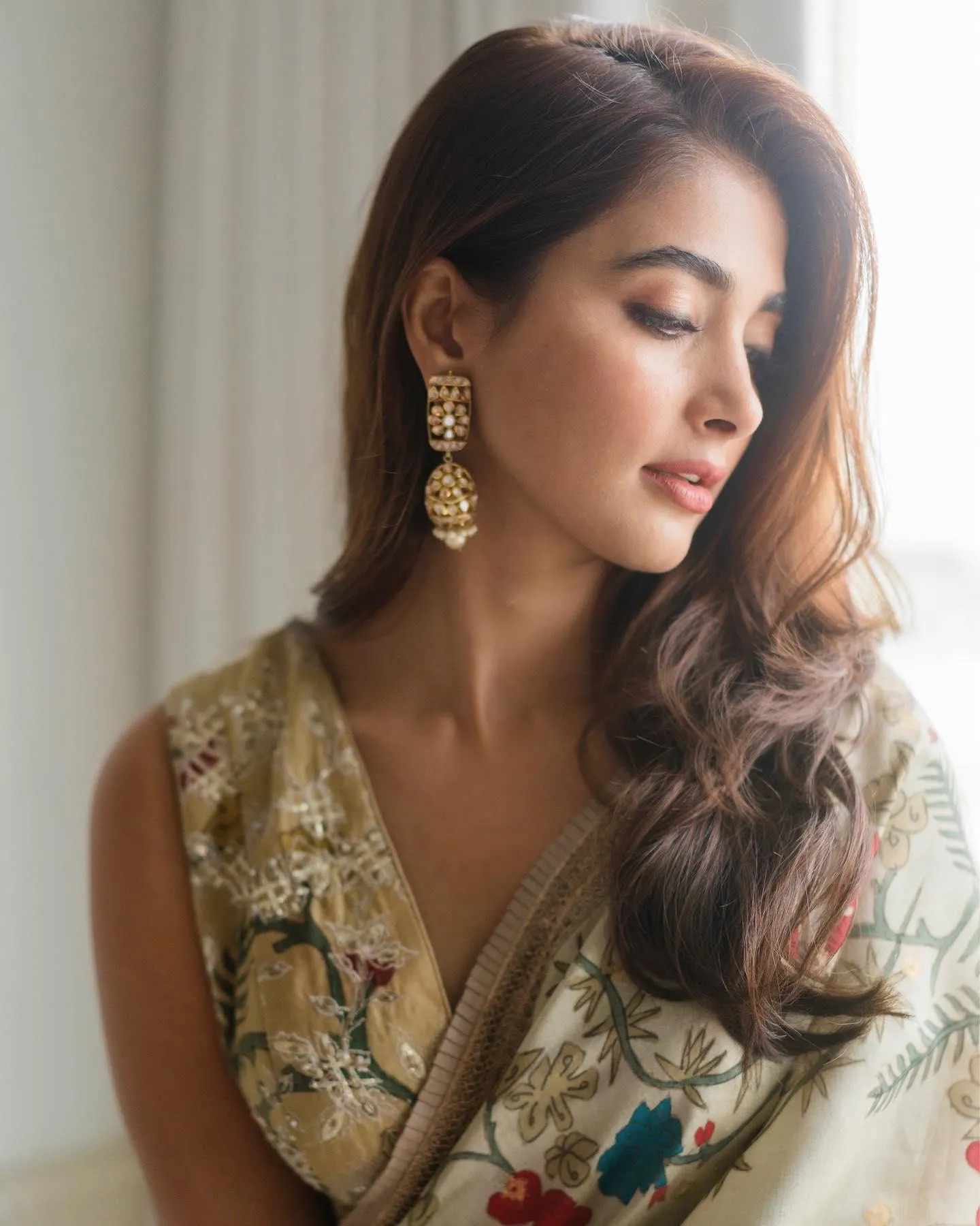 Pooja Hegde Looking Down Wearing Floral Traditional Dress