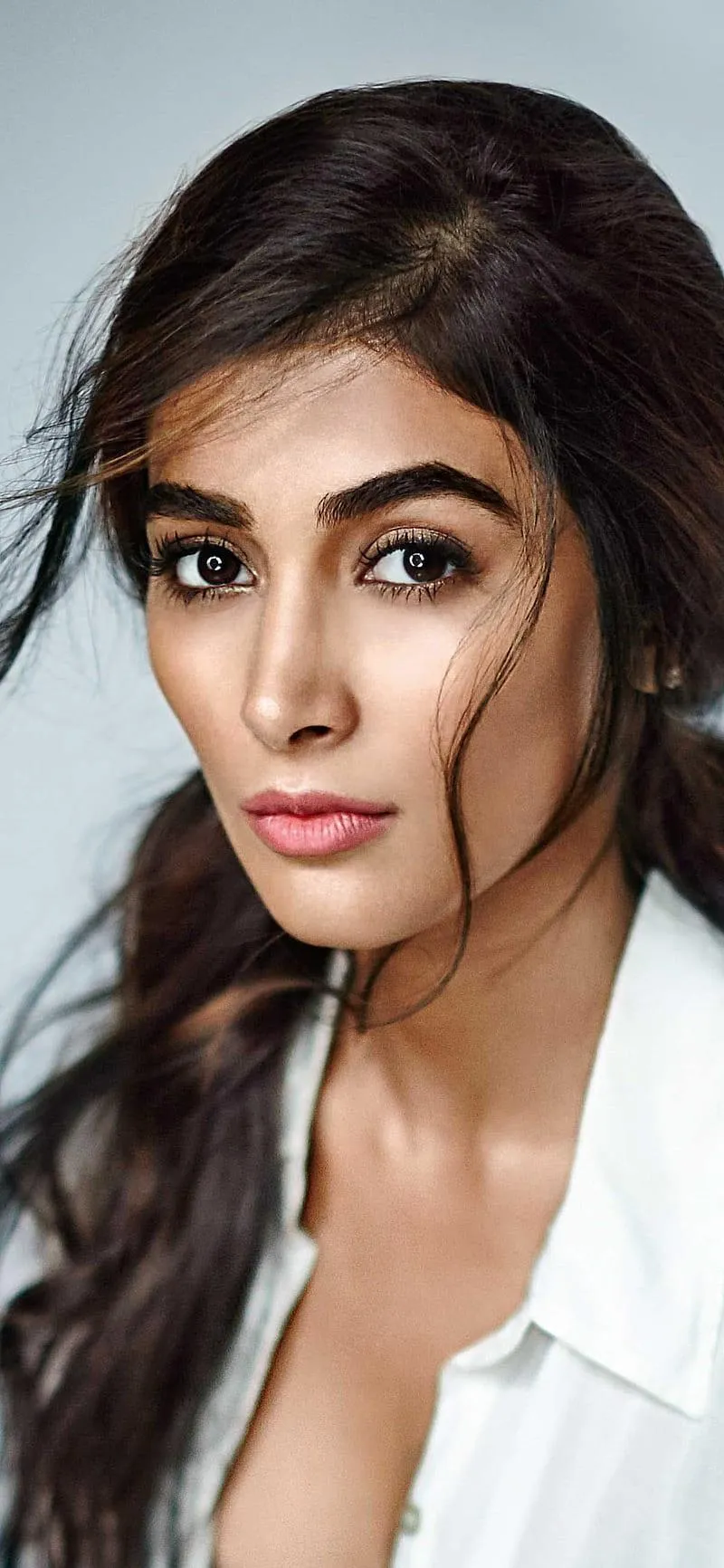 Pooja Hegde Looking Serious in White Shirt with Hair Loose