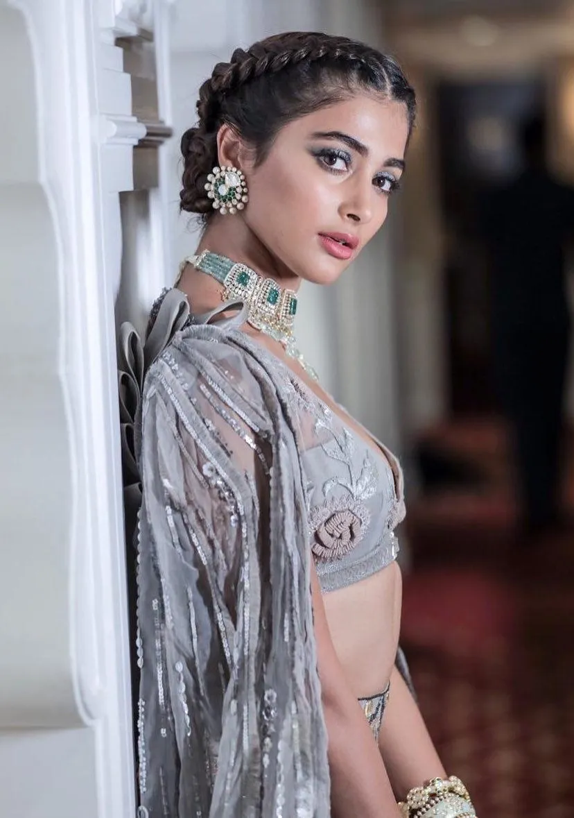 Pooja Hegde Looks Elegant in a Traditional Silver Saree