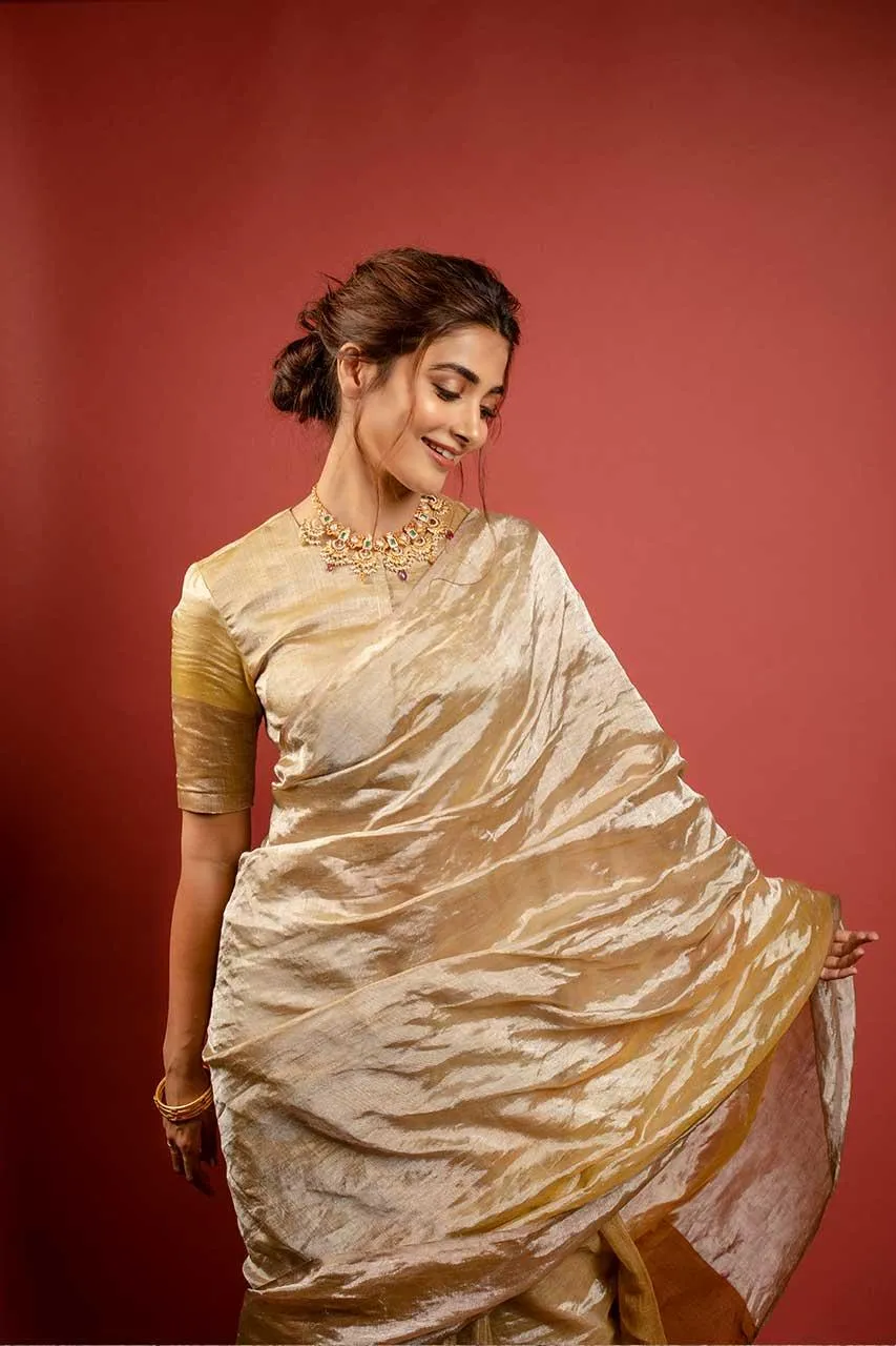 Pooja Hegde Looks Graceful in Golden Traditional Saree