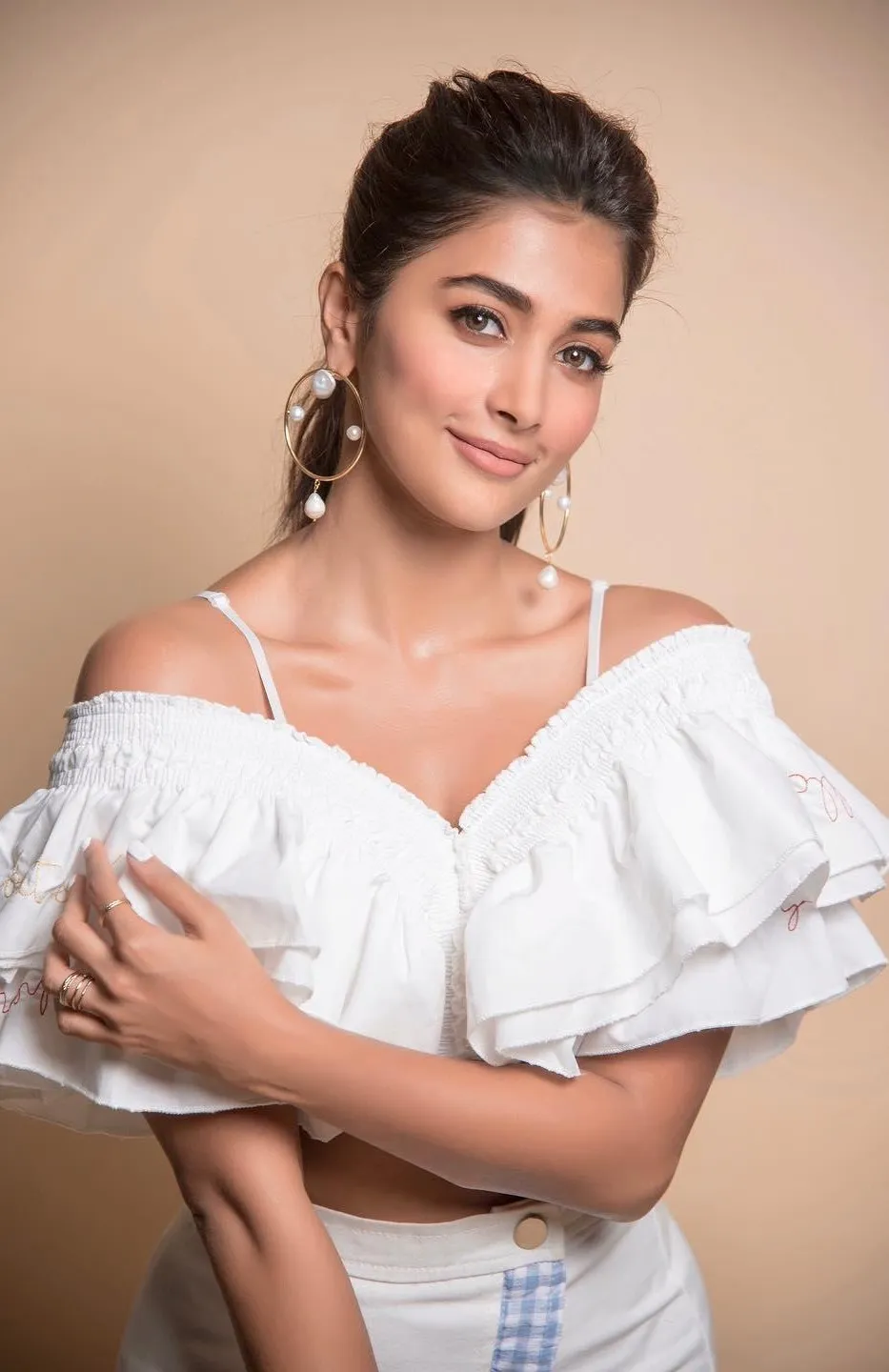 Pooja Hegde Looks Graceful in Off Shoulder White Dress