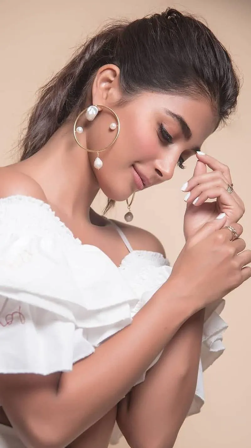 Pooja Hegde Looks Graceful in Off Shoulder White Outfit