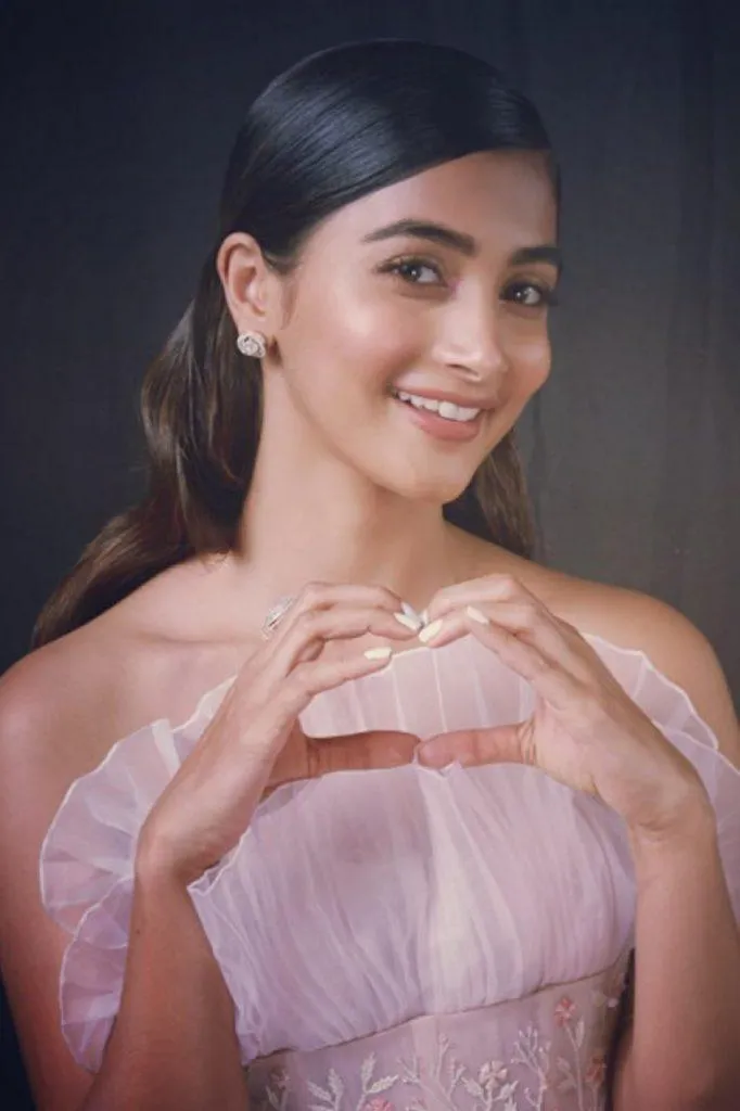 Pooja Hegde Looks Radiant in Soft Pink Strapless Gown