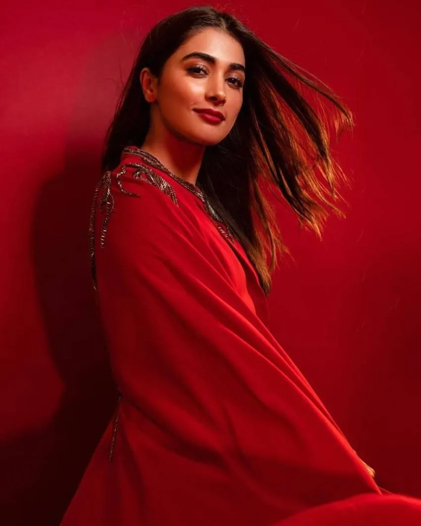 Pooja Hegde Makes Bold Statement in Stunning Red Cape Dress