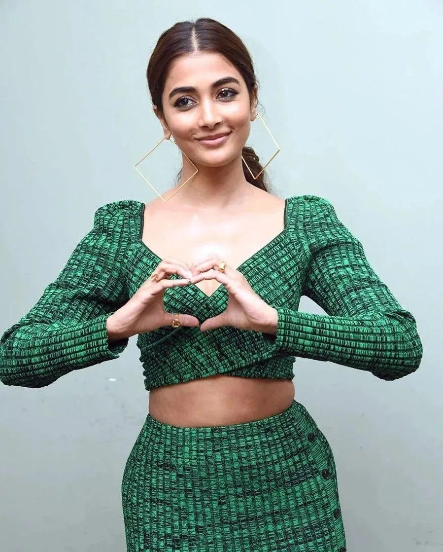 Pooja Hegde Making Heart Shape with Hands in Green