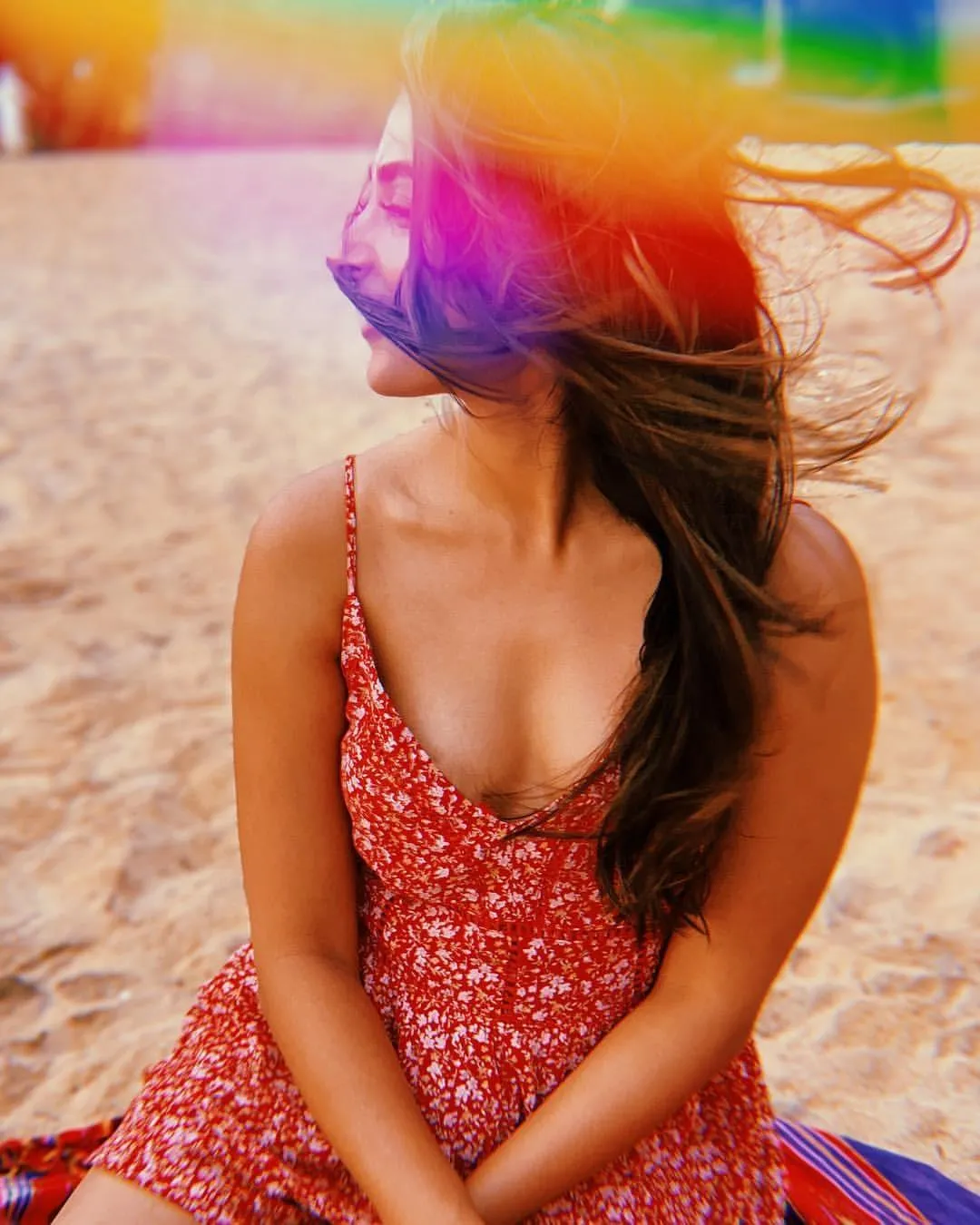 Pooja Hegde on the Beach in a Red Printed Dress