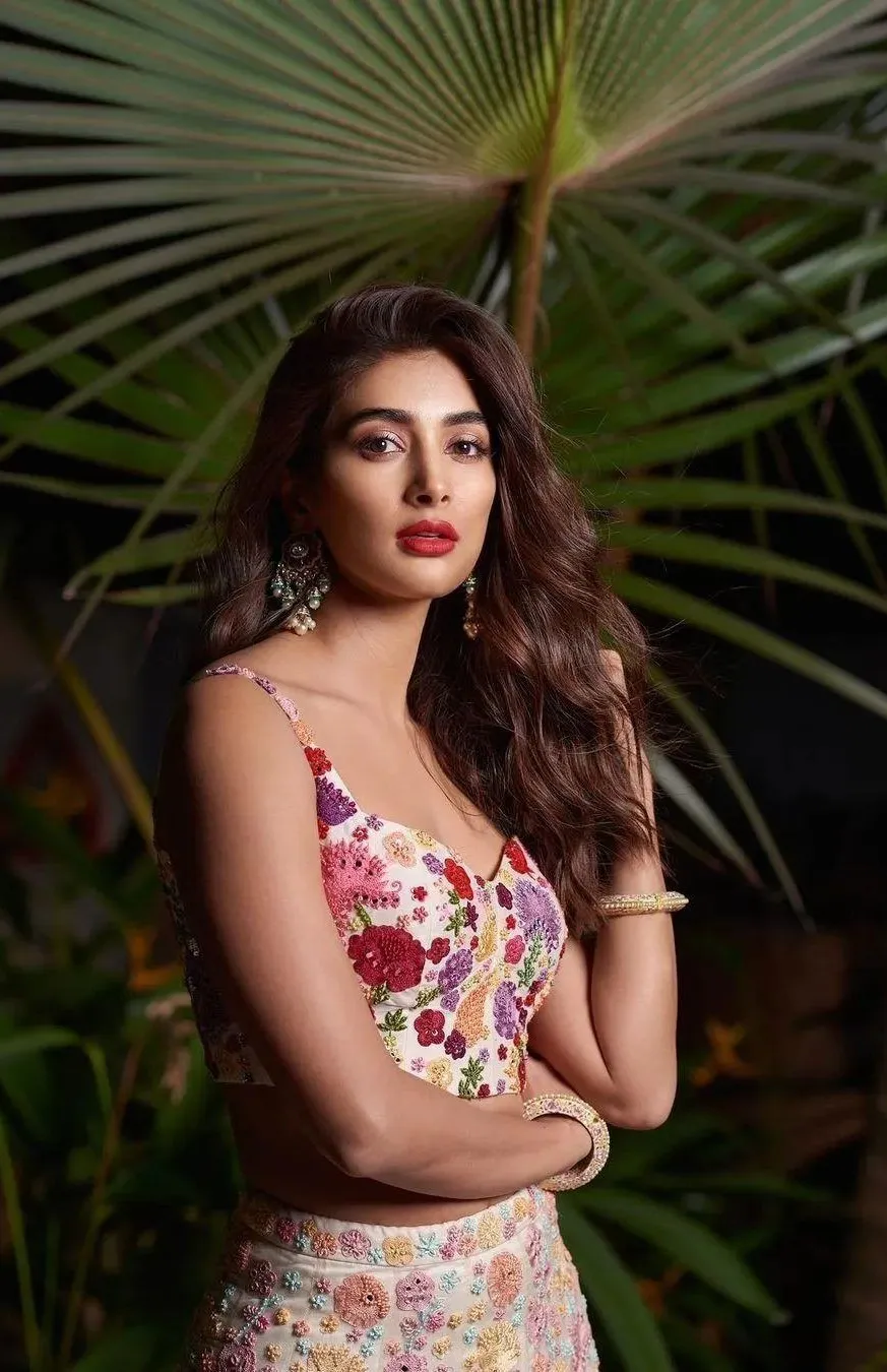 Pooja Hegde Posing Confidently in Floral Dress Wallpaper