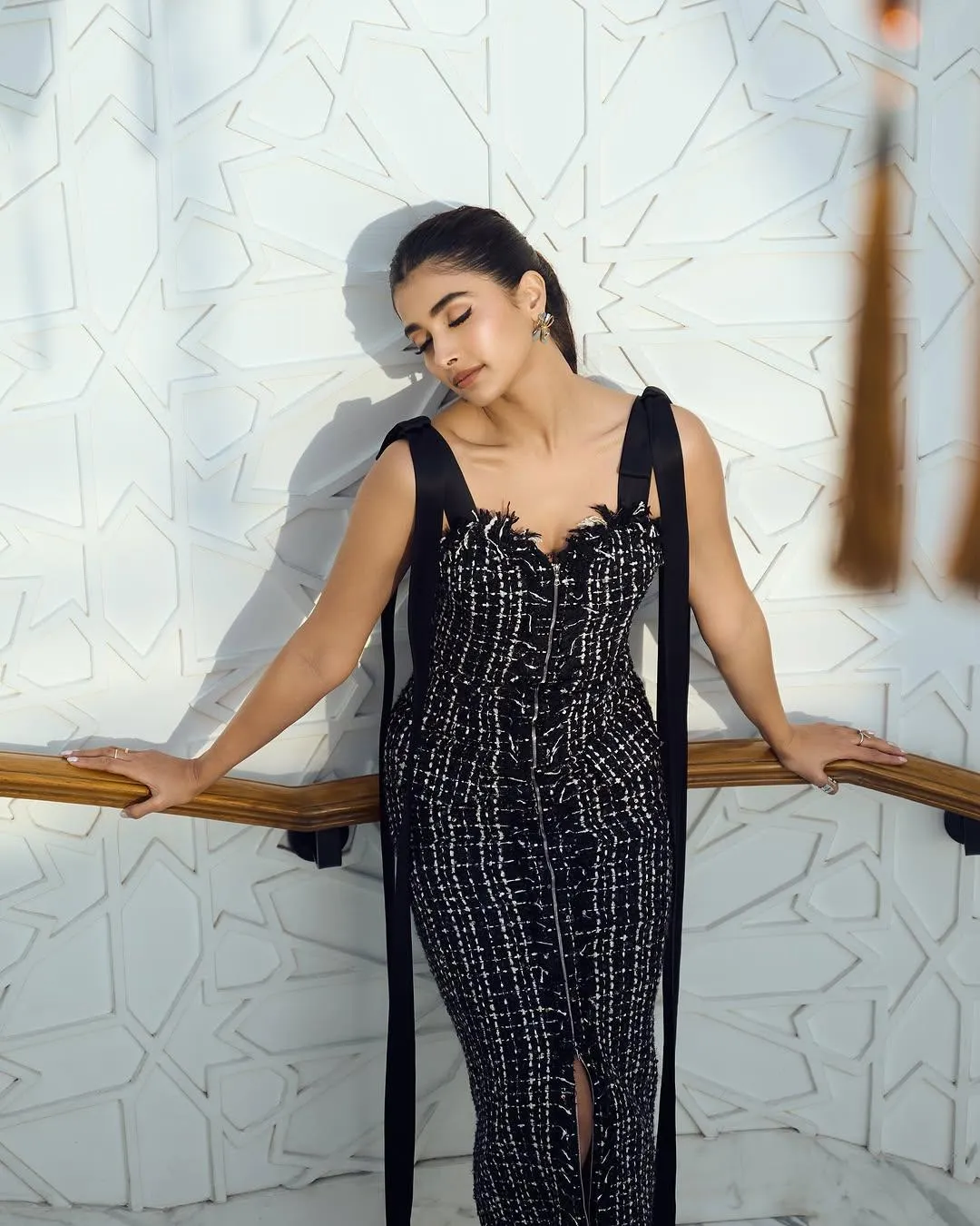 Pooja Hegde Posing Gracefully in Black Dress Wallpaper
