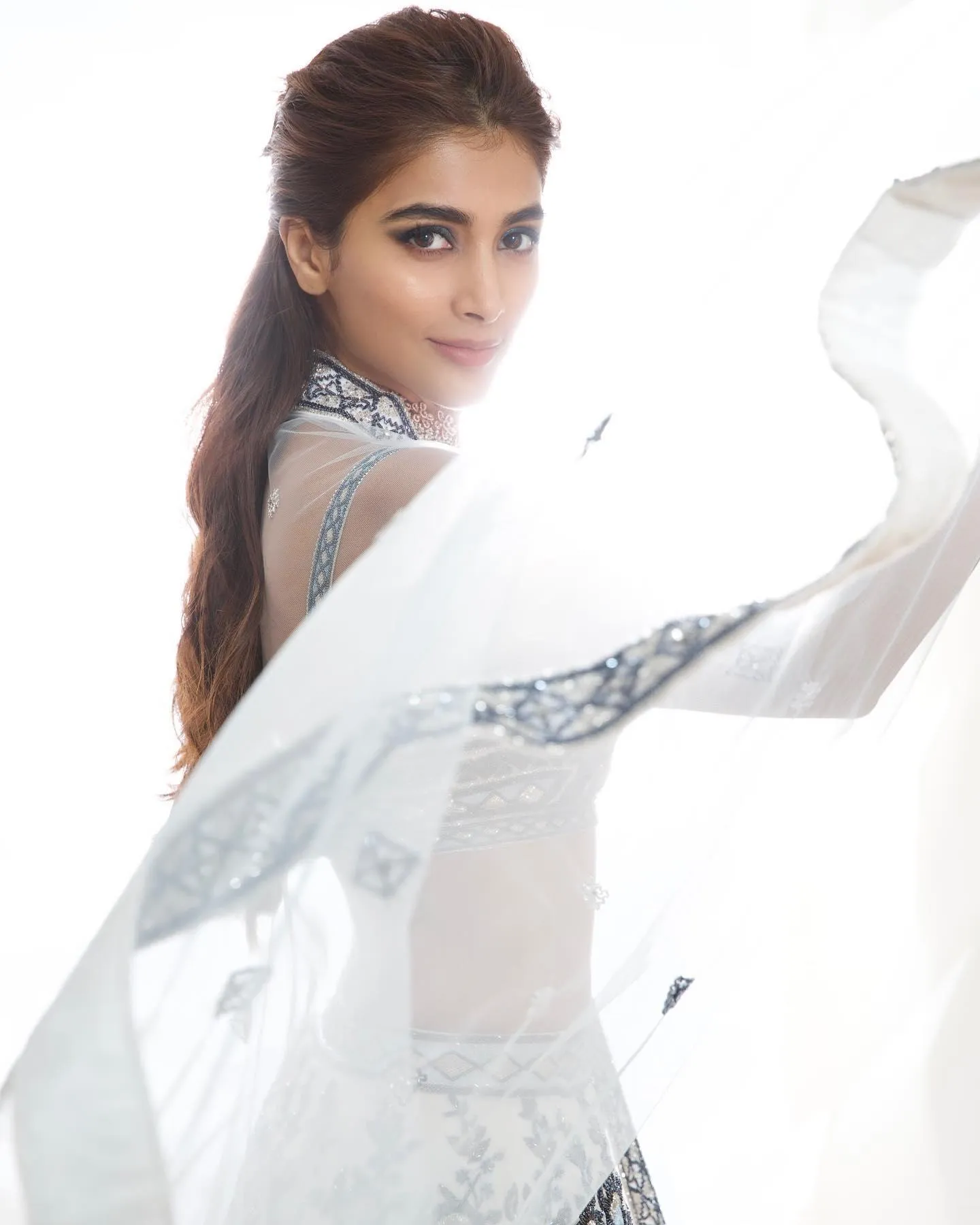 Pooja Hegde Posing Gracefully in White Saree Look Wallpaper