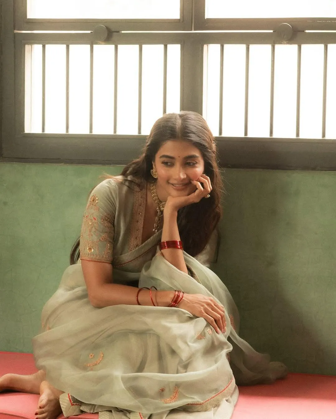 Pooja Hegde Relaxing in Traditional Dress Indoors Wallpaper