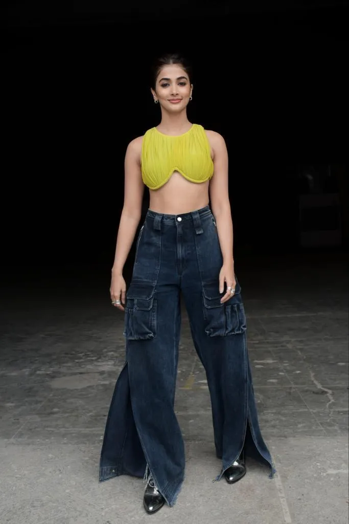 Pooja Hegde Rocks Neon Top with Wide Leg Jeans and Style