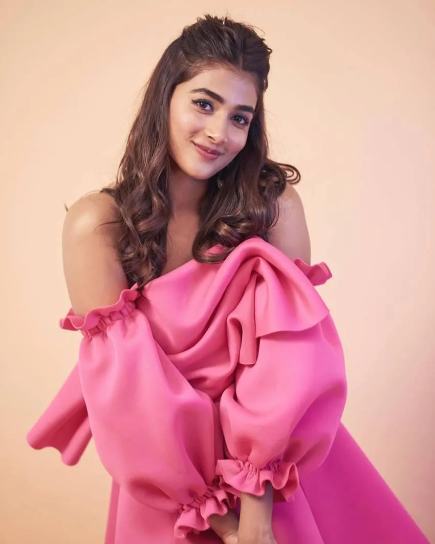 Pooja Hegde Smiles in Puffy Pink Dress with Fun Expression