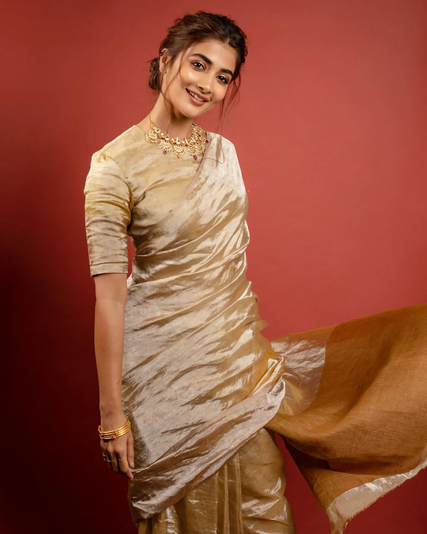Pooja Hegde Smiling Brightly in Traditional Attire