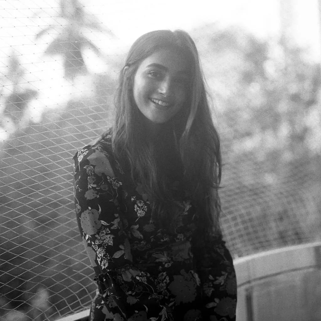 Pooja Hegde Smiling in Black and White Portrait Shot 4K