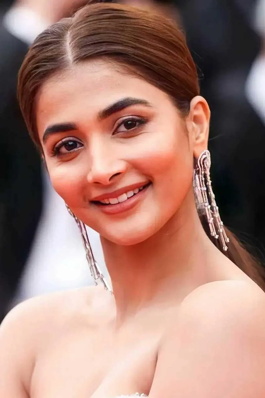 Pooja Hegde Smiling in White Dress At Celebrity Event
