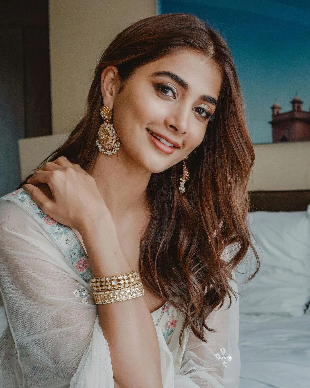 Pooja Hegde Smiling Softly Wearing Light Outfit Indoors
