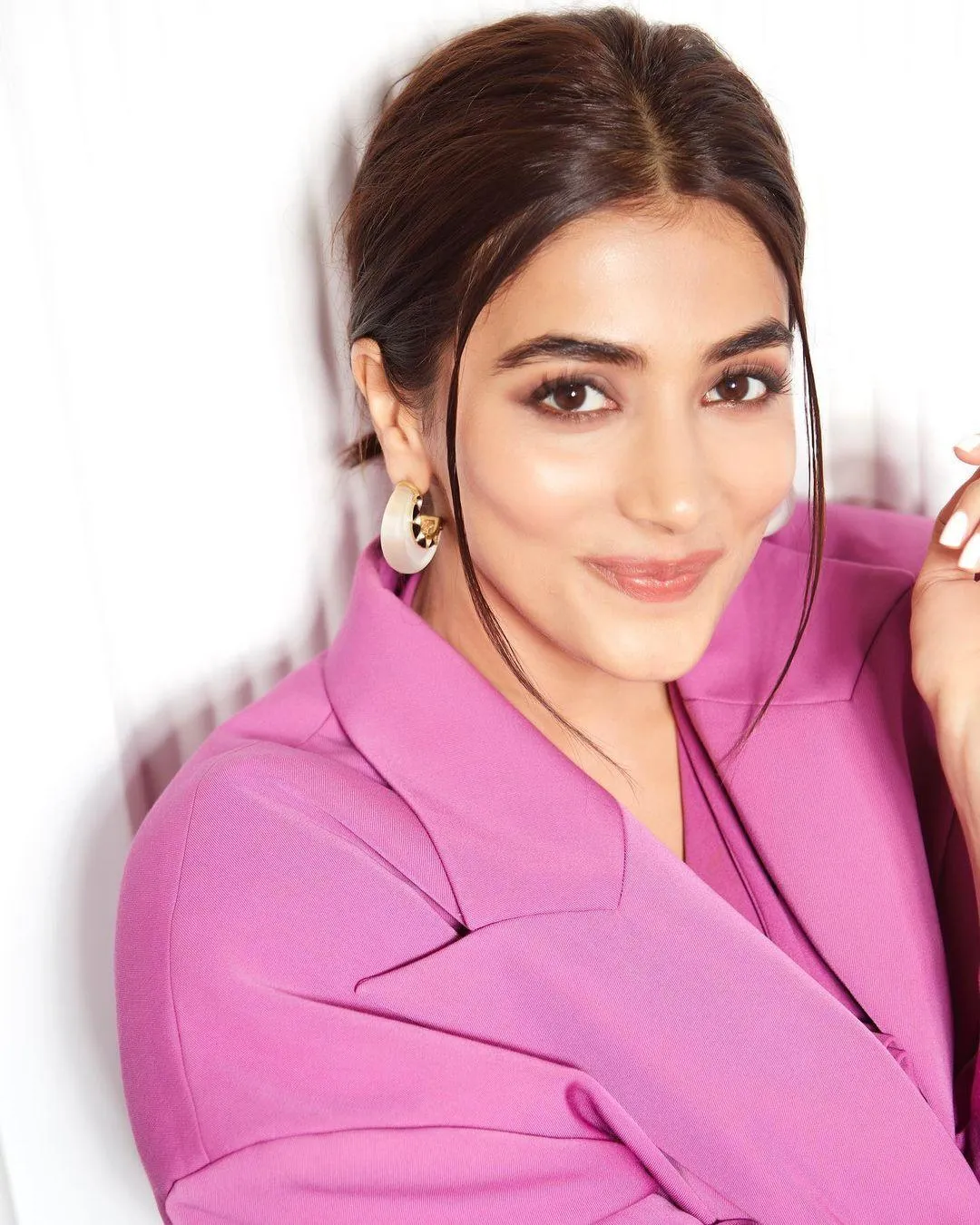 Pooja Hegde Smiling While Wearing Pink Blazer Wallpaper