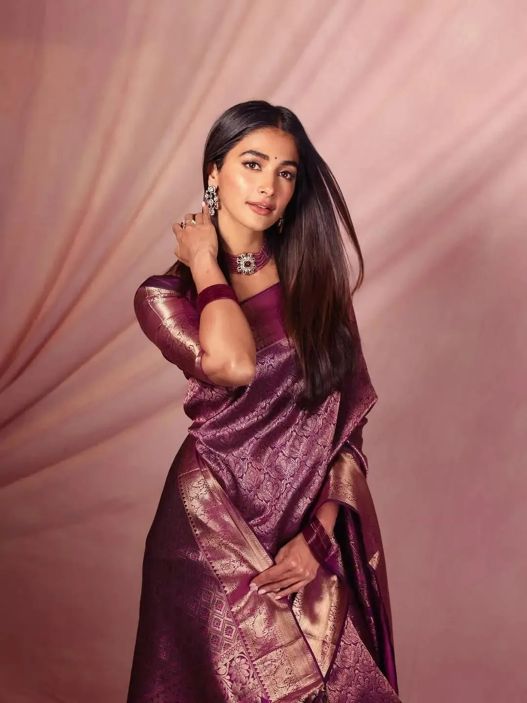 Pooja Hegde Standing Gracefully in Silk Saree Look