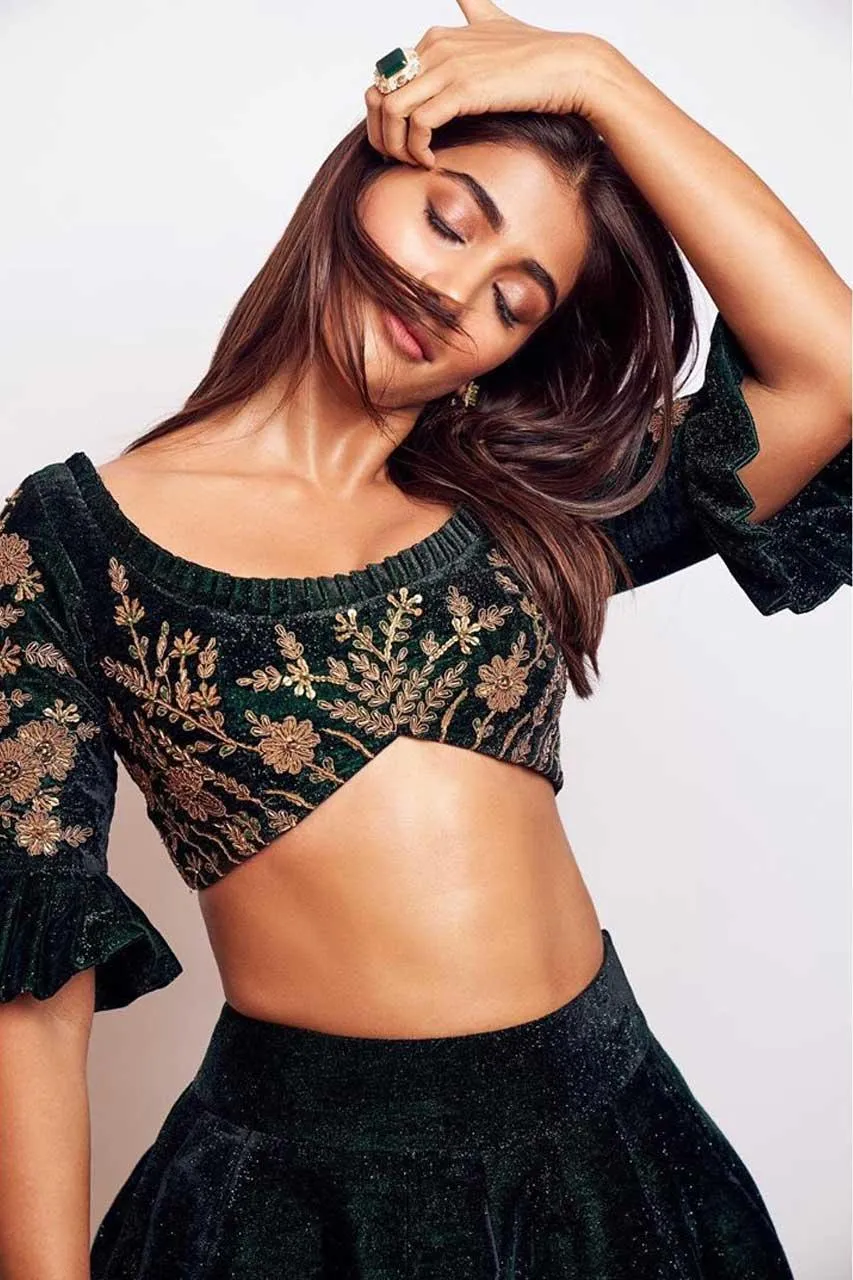 Pooja Hegde Striking a Pose in Black and Gold Designer Wear