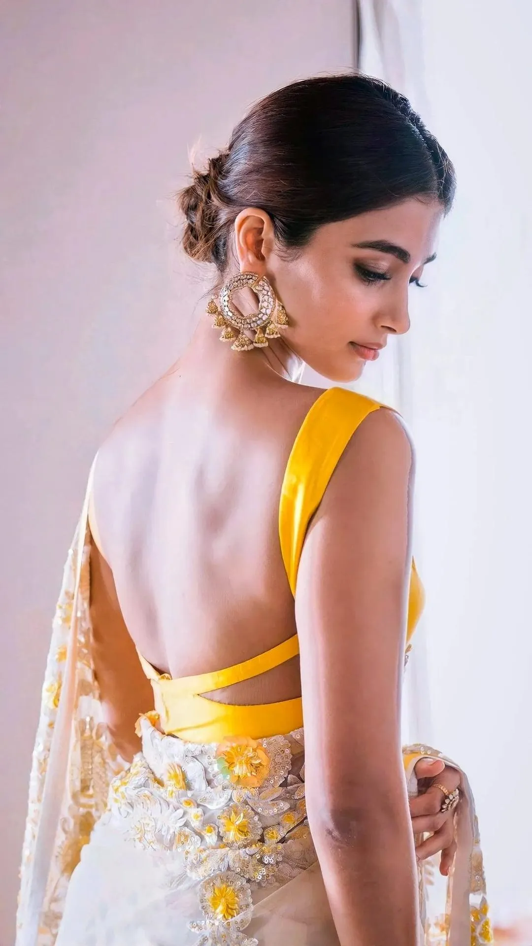 Pooja Hegde Stuns in a Floral Embroidered Yellow Outfit