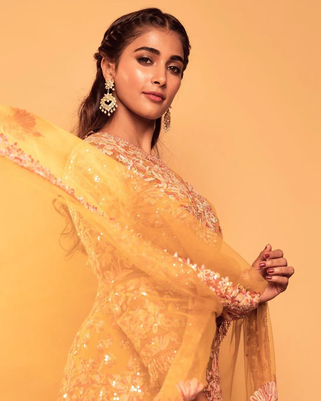 Pooja Hegde Stuns in Golden Ethnic Lehenga Look Wallpaper