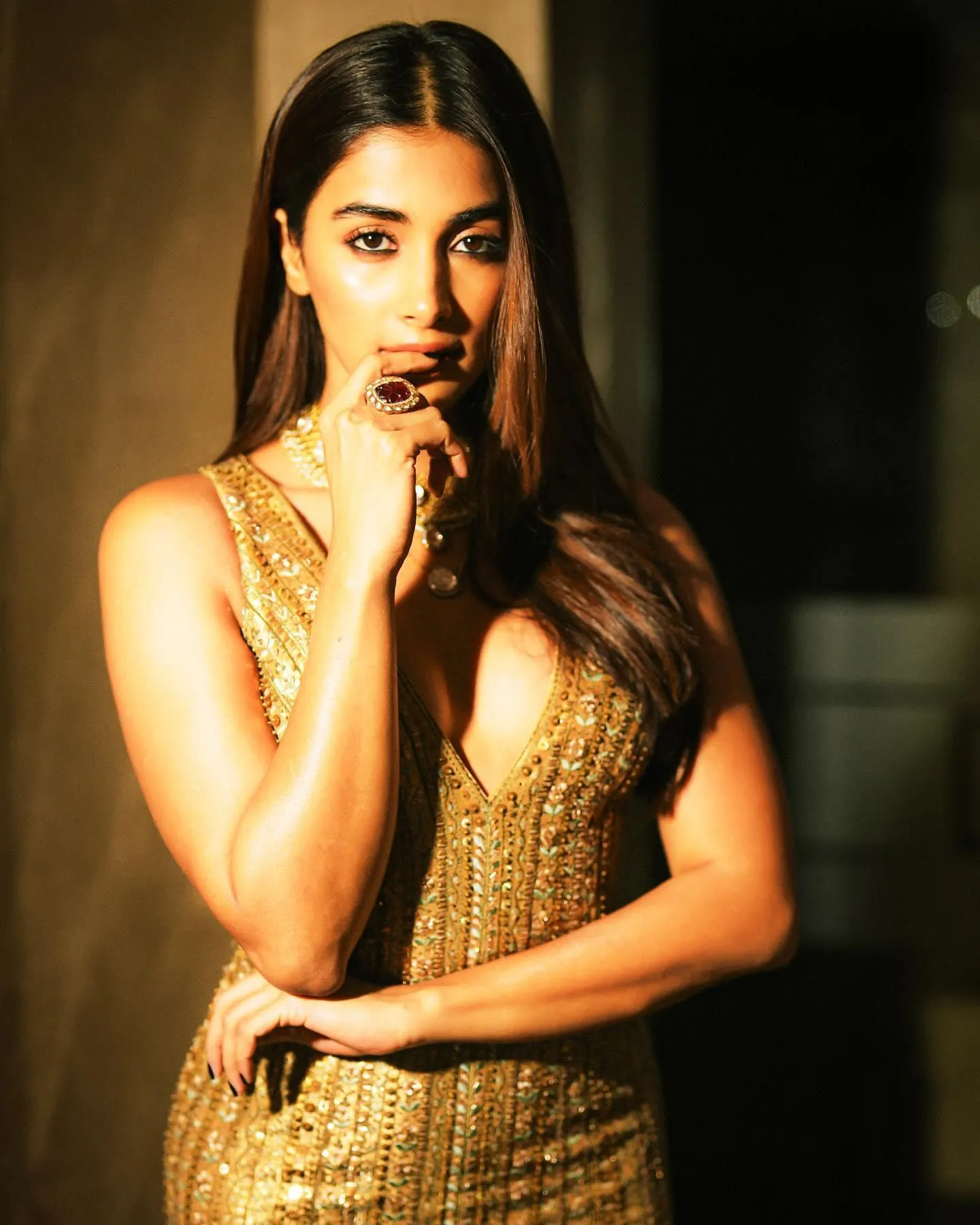 Pooja Hegde Thinking Deeply Wearing Golden Outfit Wallpaper