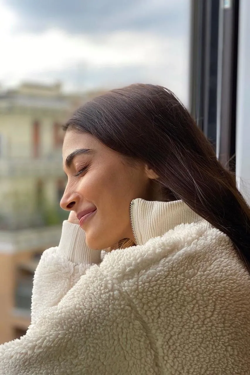 Pooja Hegde Thoughtful Pose Looking Out Window Relaxed