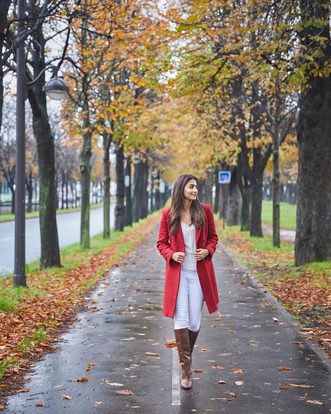 Pooja Hegde Walking Down Autumn Street in Stylish Red Coat