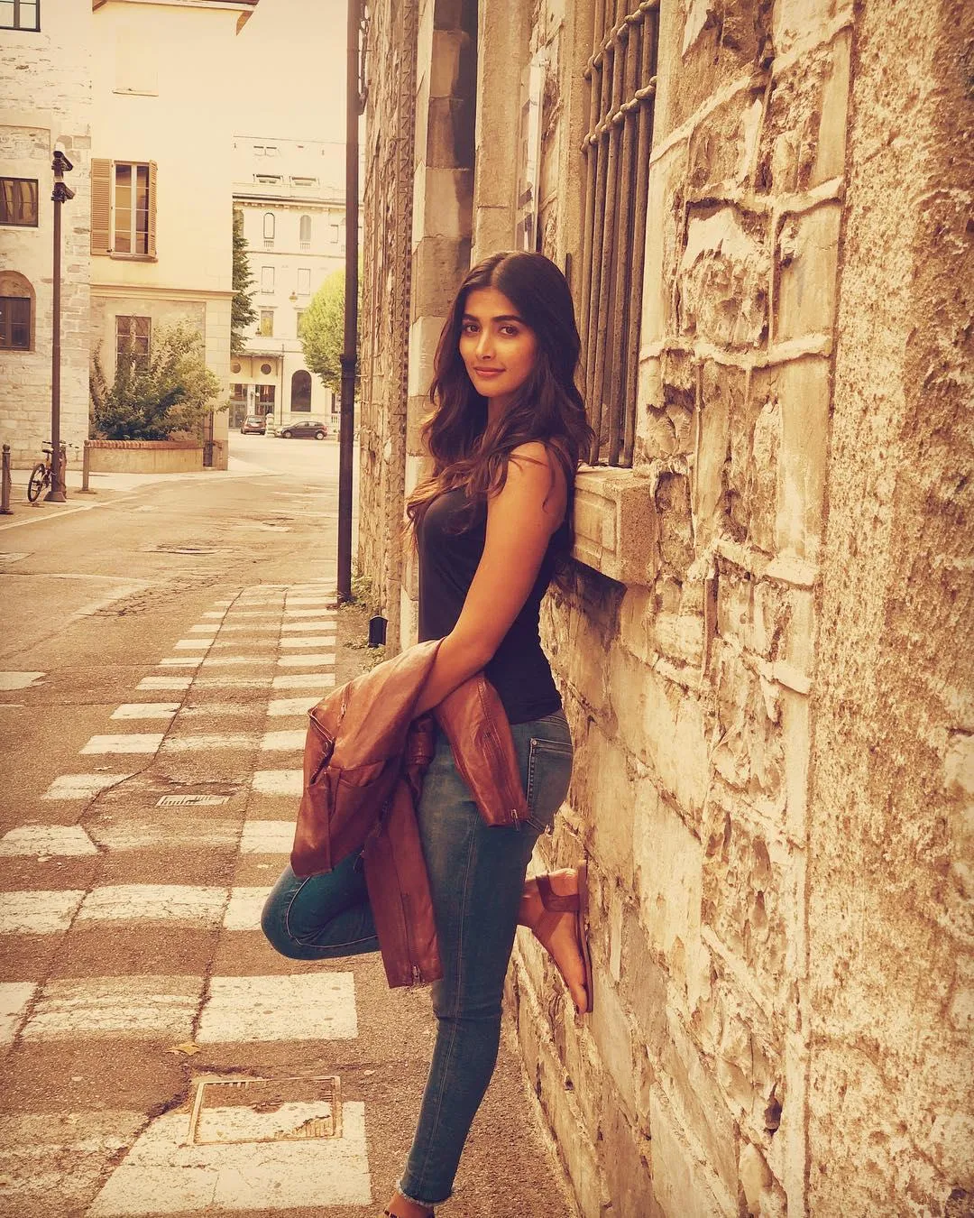 Pooja Hegde Walks on Rustic Street in Casual Look Wallpaper