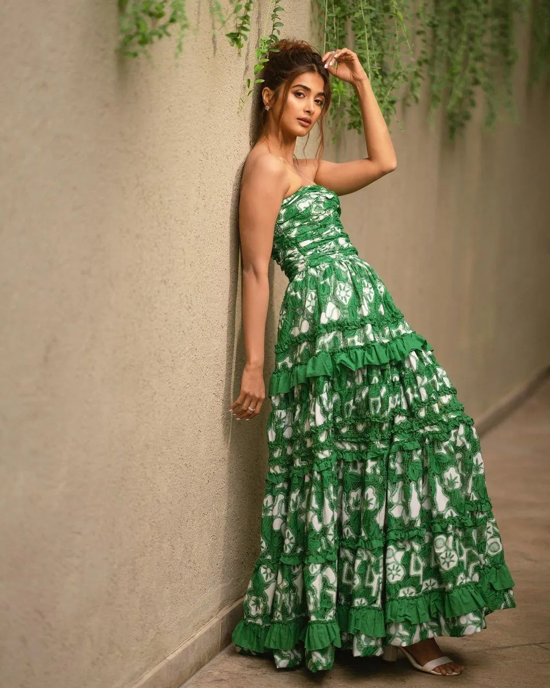 Pooja Hegde Wearing a Beautiful Green Floral Dress Image