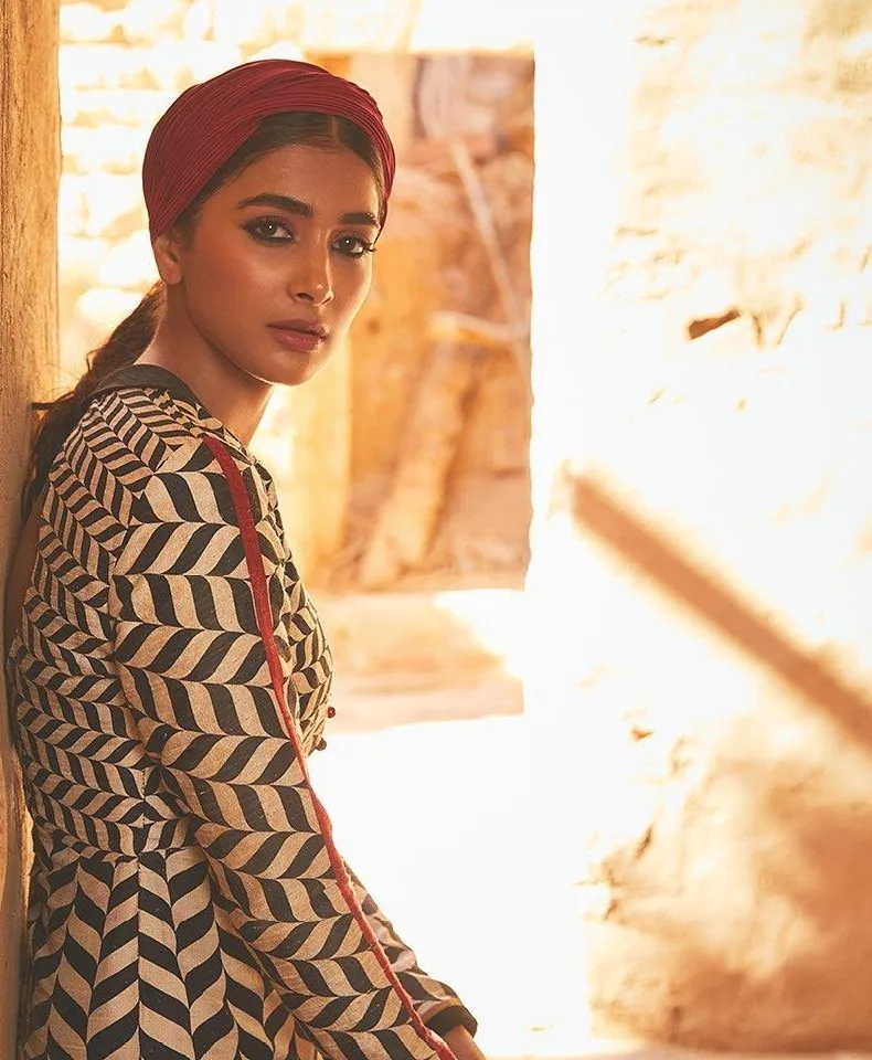 Pooja Hegde Wearing Printed Outfit in Warm Lighting Image