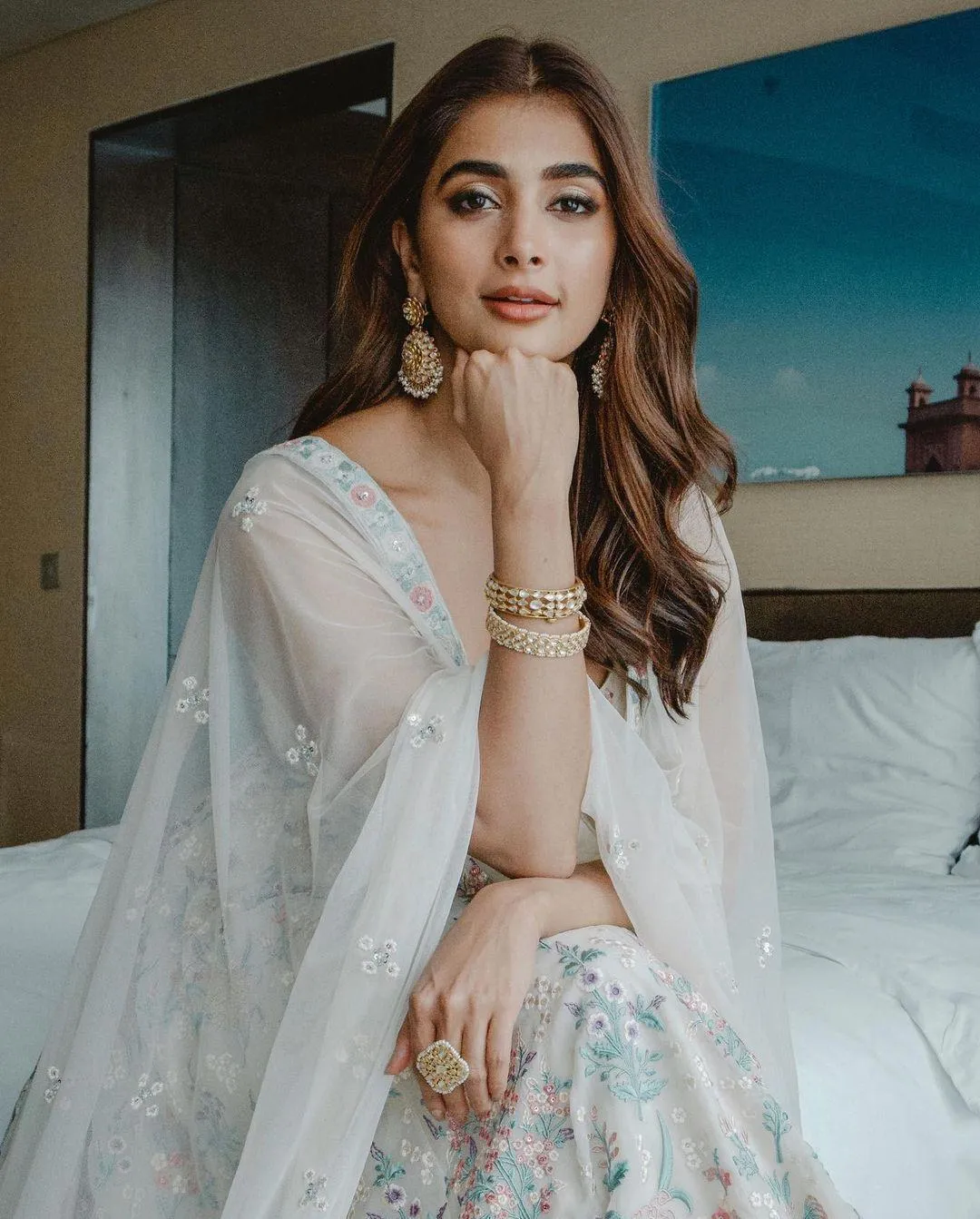 Pooja Hegde Wearing White Traditional Outfit Sitting