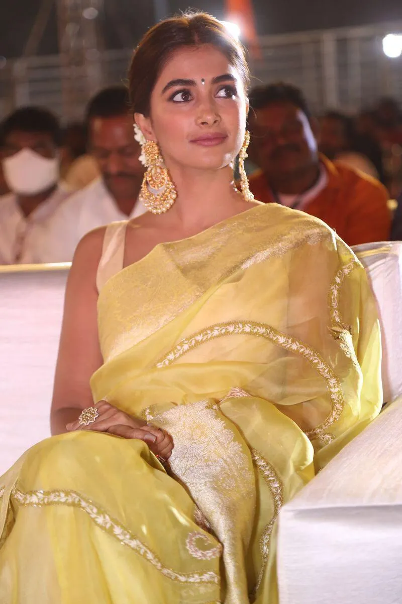 Pooja Hegde Wearing Yellow Saree At Cultural Event Image