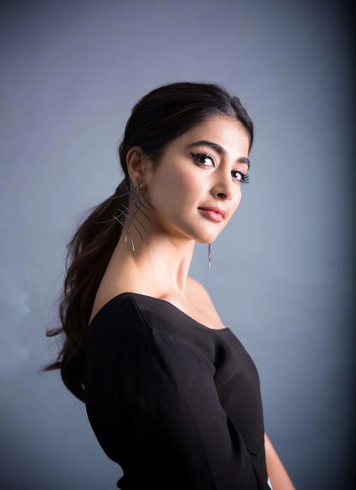 Pooja Hegde with a Sleek Ponytail and Minimal Makeup
