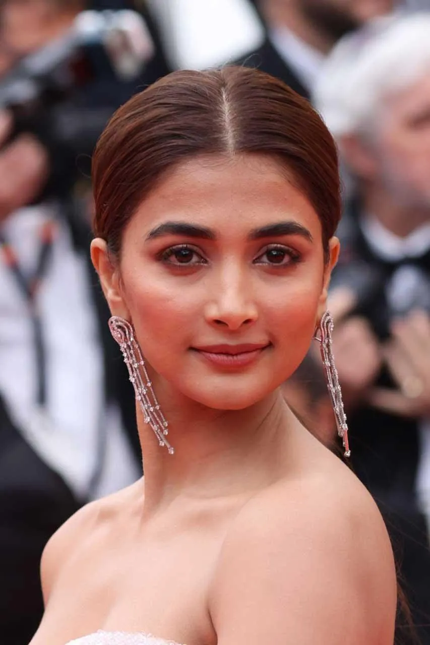 Pooja Hegde with Sleek Bun Look At Film Festival Appearance