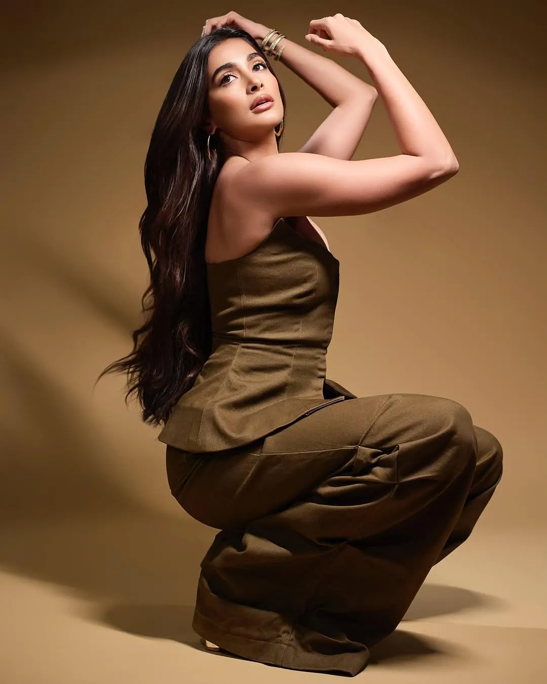 Powerful Pose of Pooja Hegde in a Stylish Brown Outfit