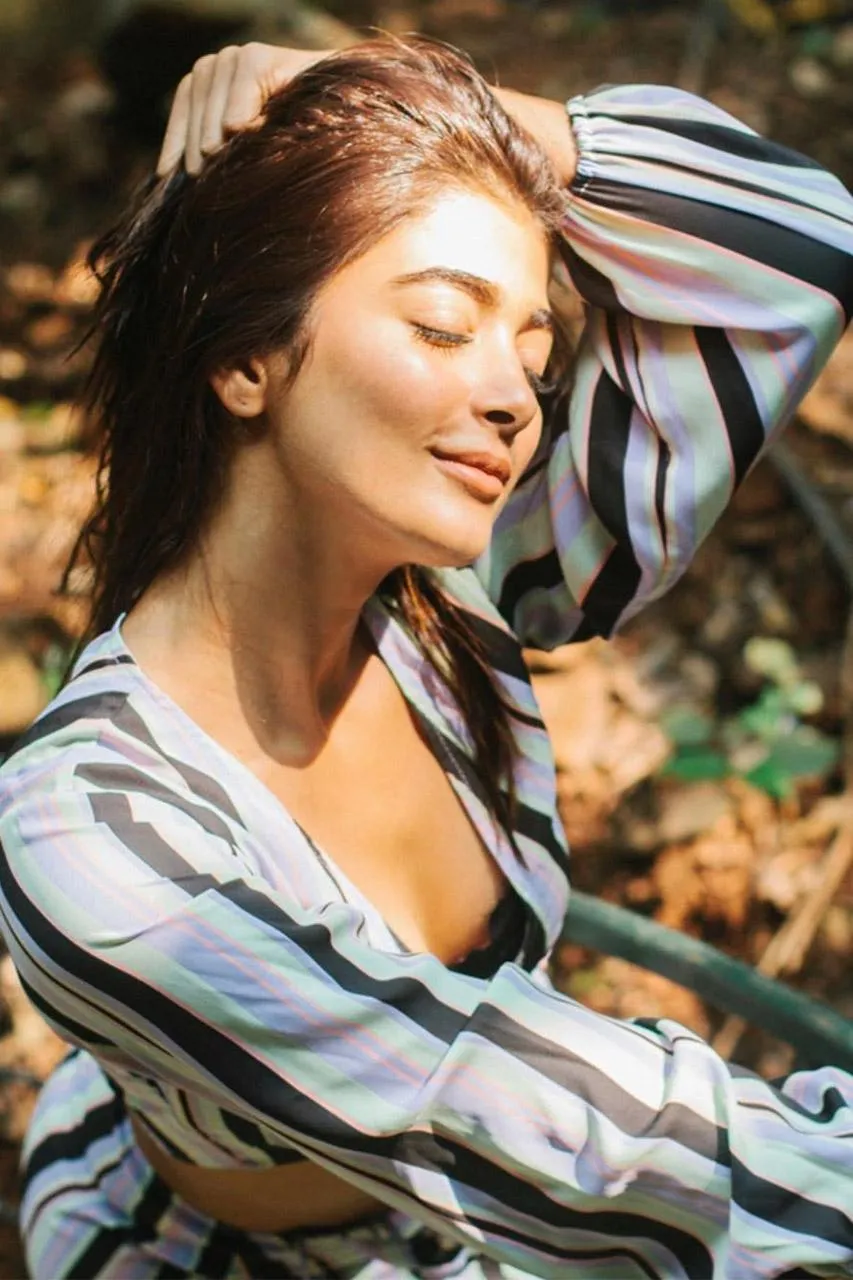 Relaxed Pooja Hegde Smiling Wearing Striped Shirt in Garden