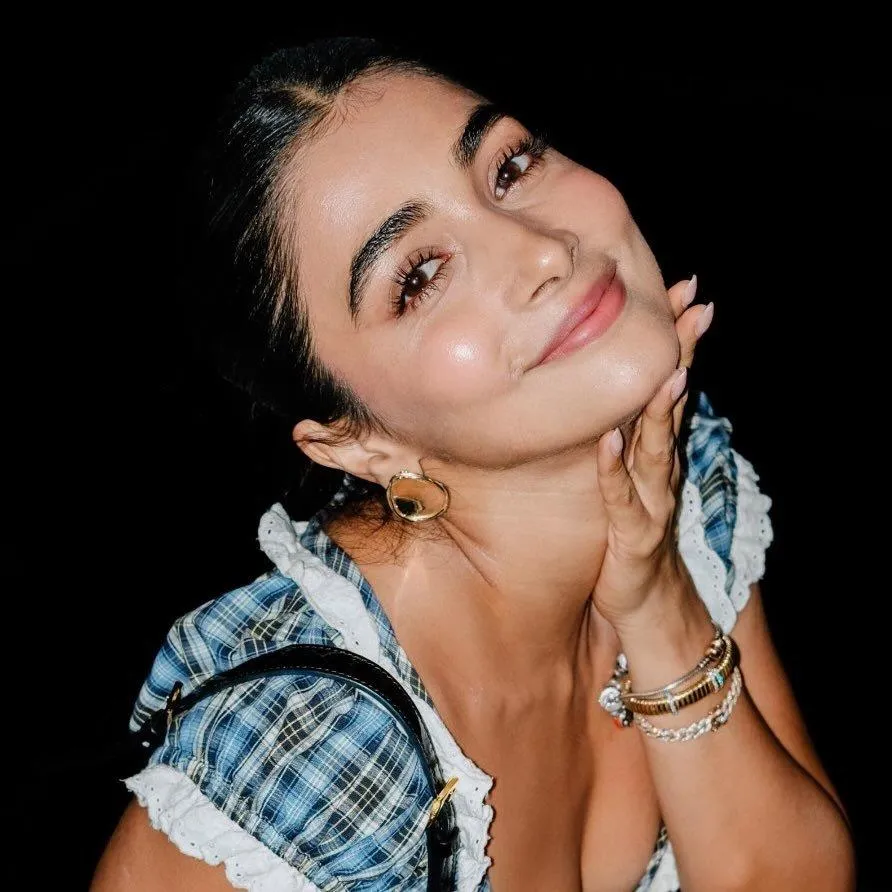 Smiling Candid of Pooja Hegde in a Checked Denim Outfit