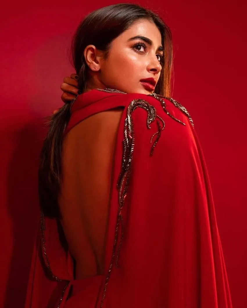 Striking Red Dress Look By Pooja Hegde with Intense Gaze