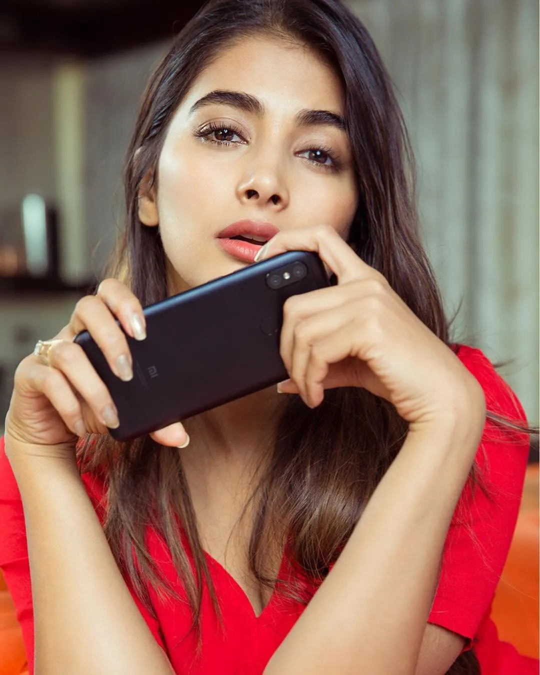 Stylish Pooja Hegde Holding Phone Wearing Red Dress