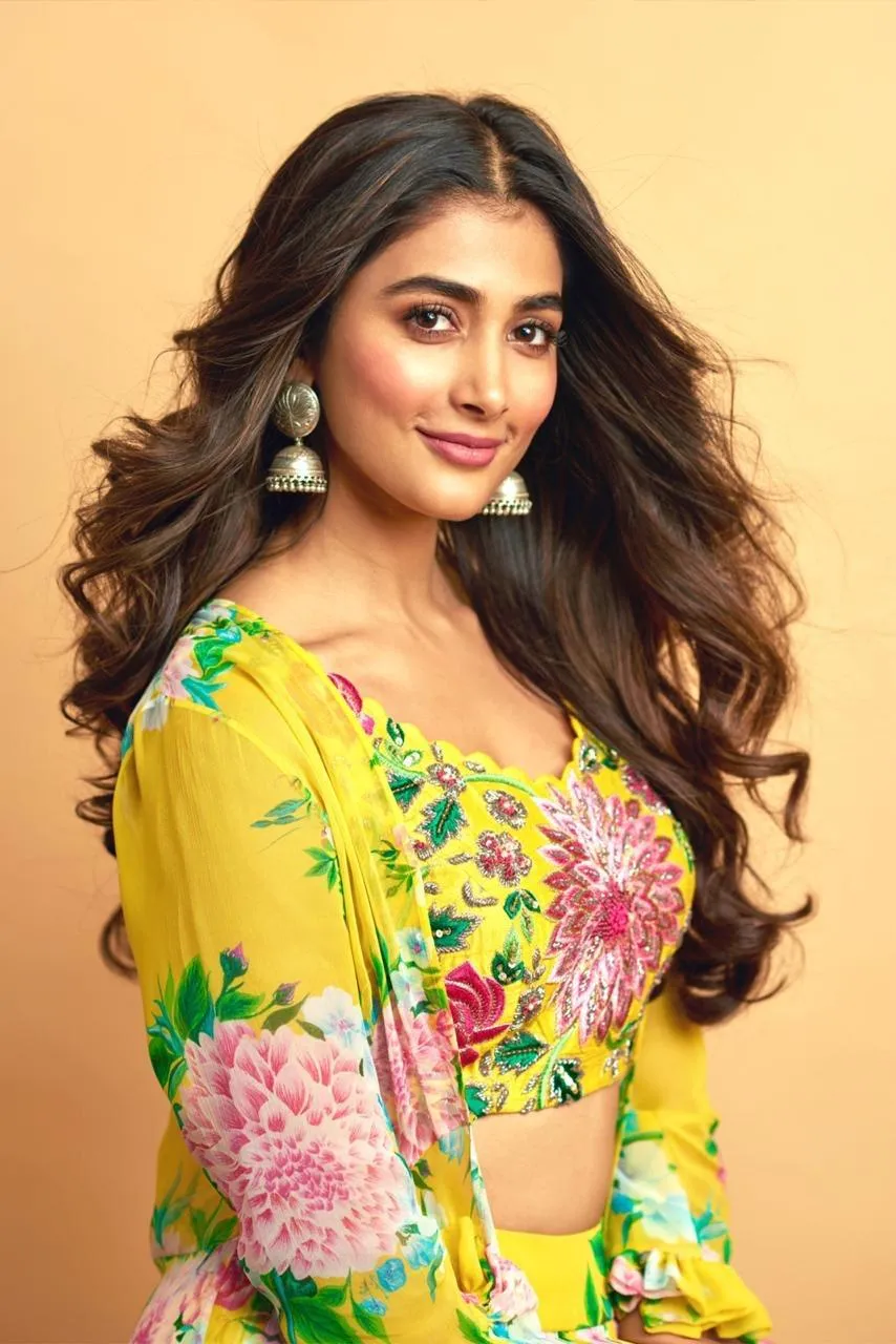 Vibrant Pooja Hegde in Yellow Floral Printed Dress Posing