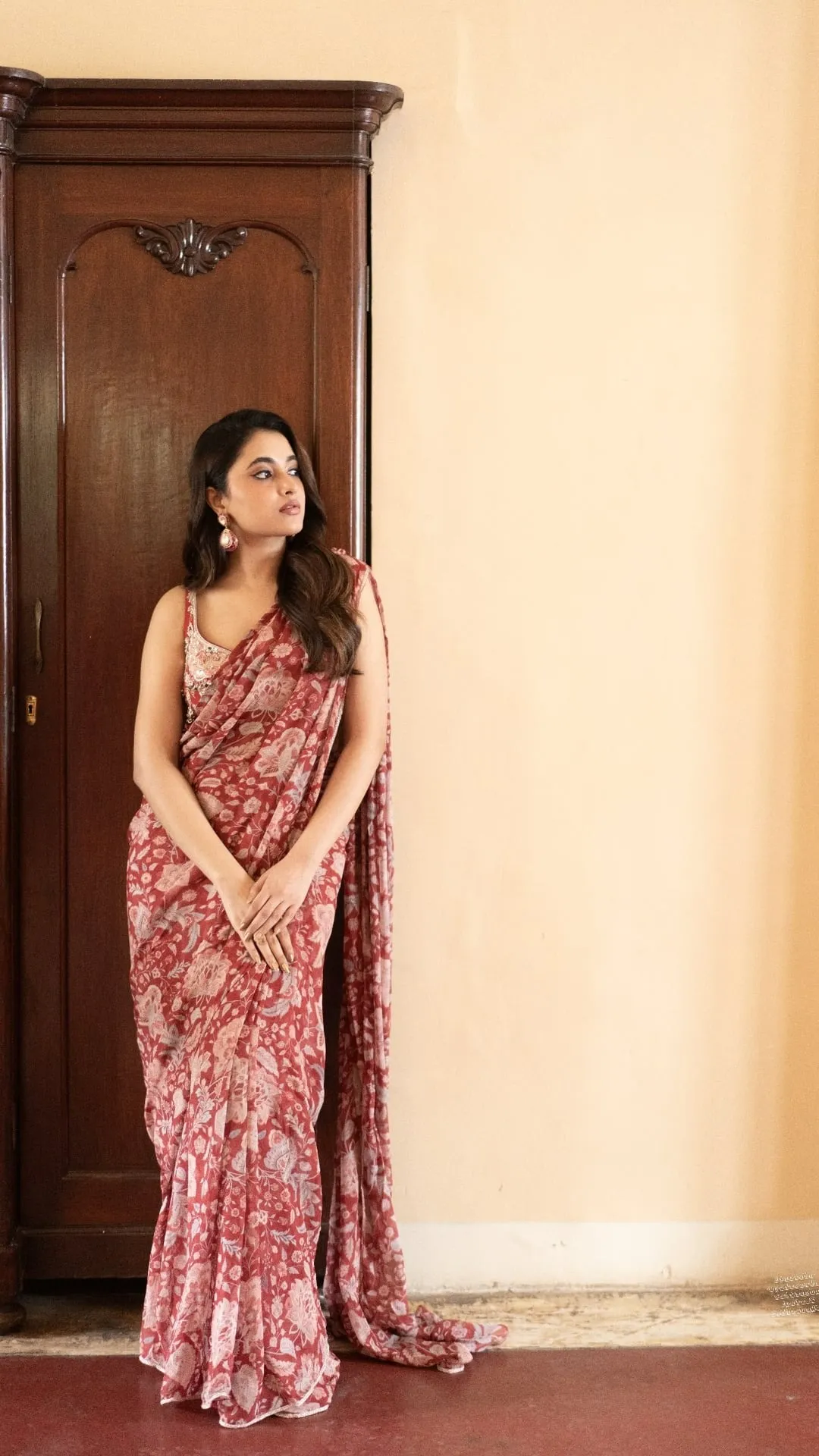 Angelic Image of Priyanka Mohan Wearing a Floral Red Saree