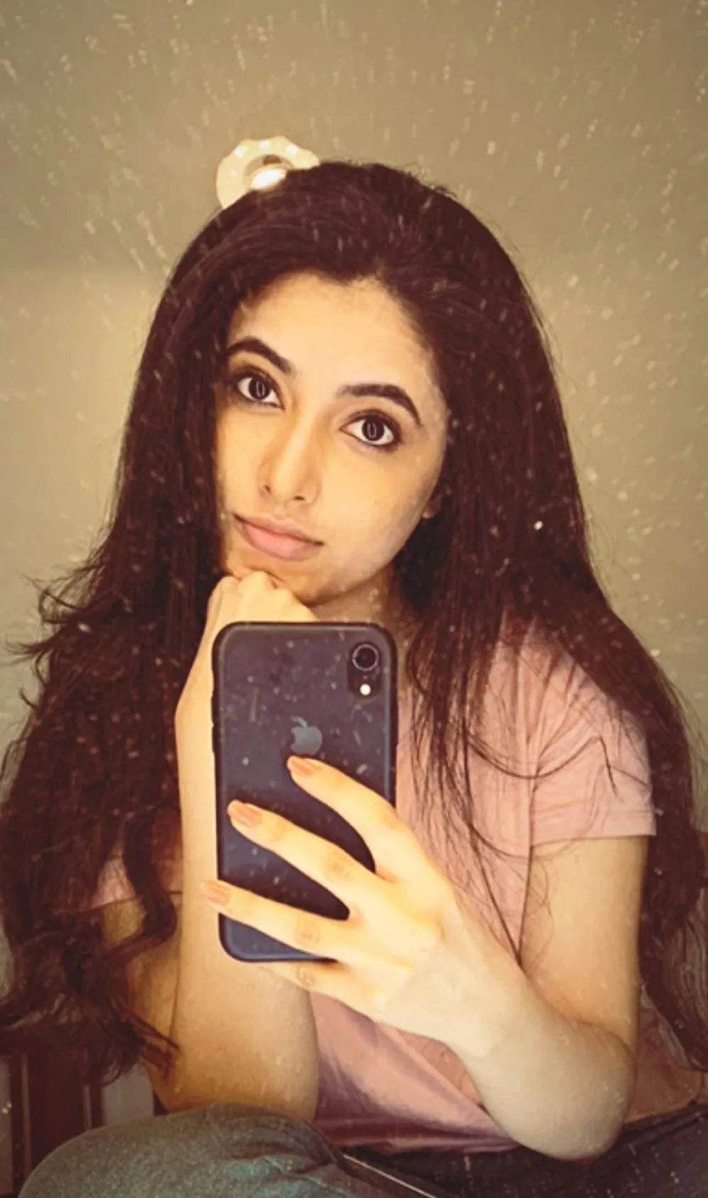 Artistic Image of Priyanka Mohan Holding a Mobile Phone