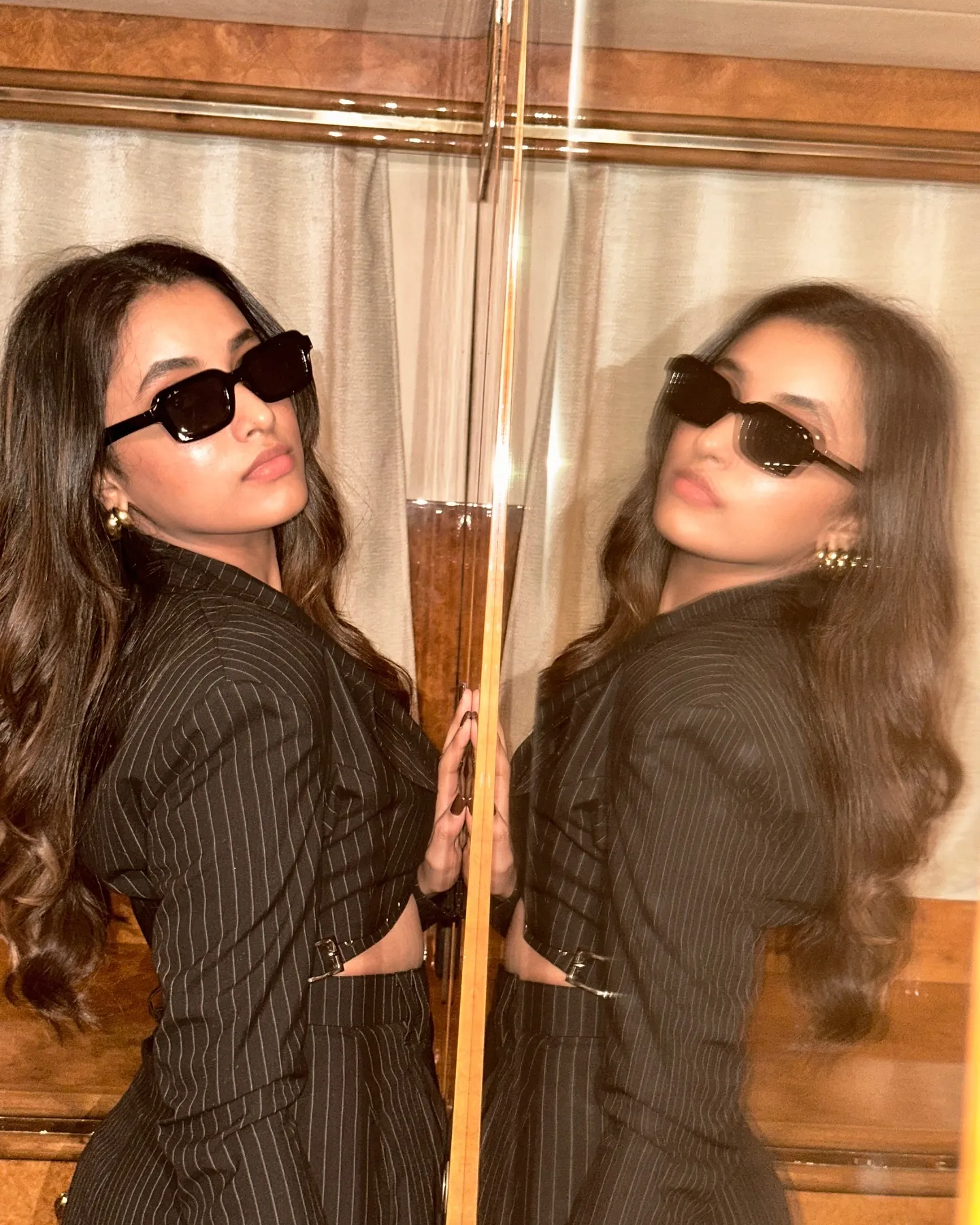 Artistic Image of Priyanka Mohan Standing Near the Mirror