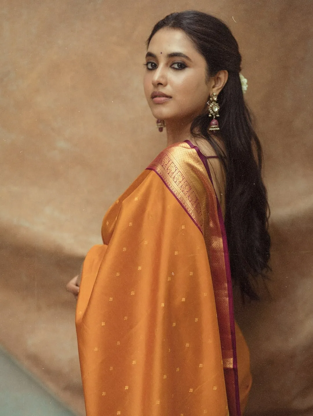Attractive Wallpaper of Priyanka Mohan in an Orange Saree
