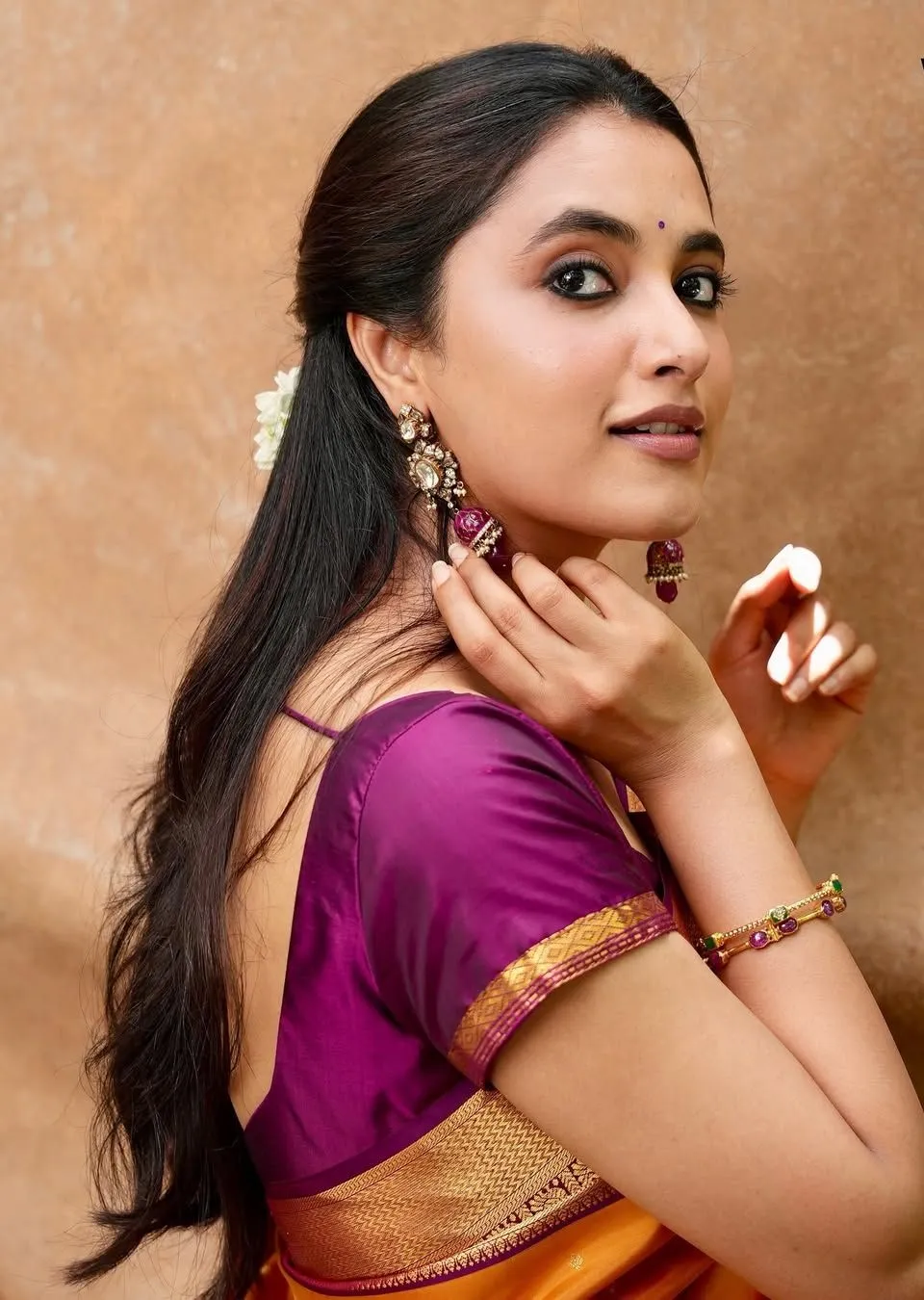 Beautiful Image of Priyanka Mohan Standing Near Orange Wall
