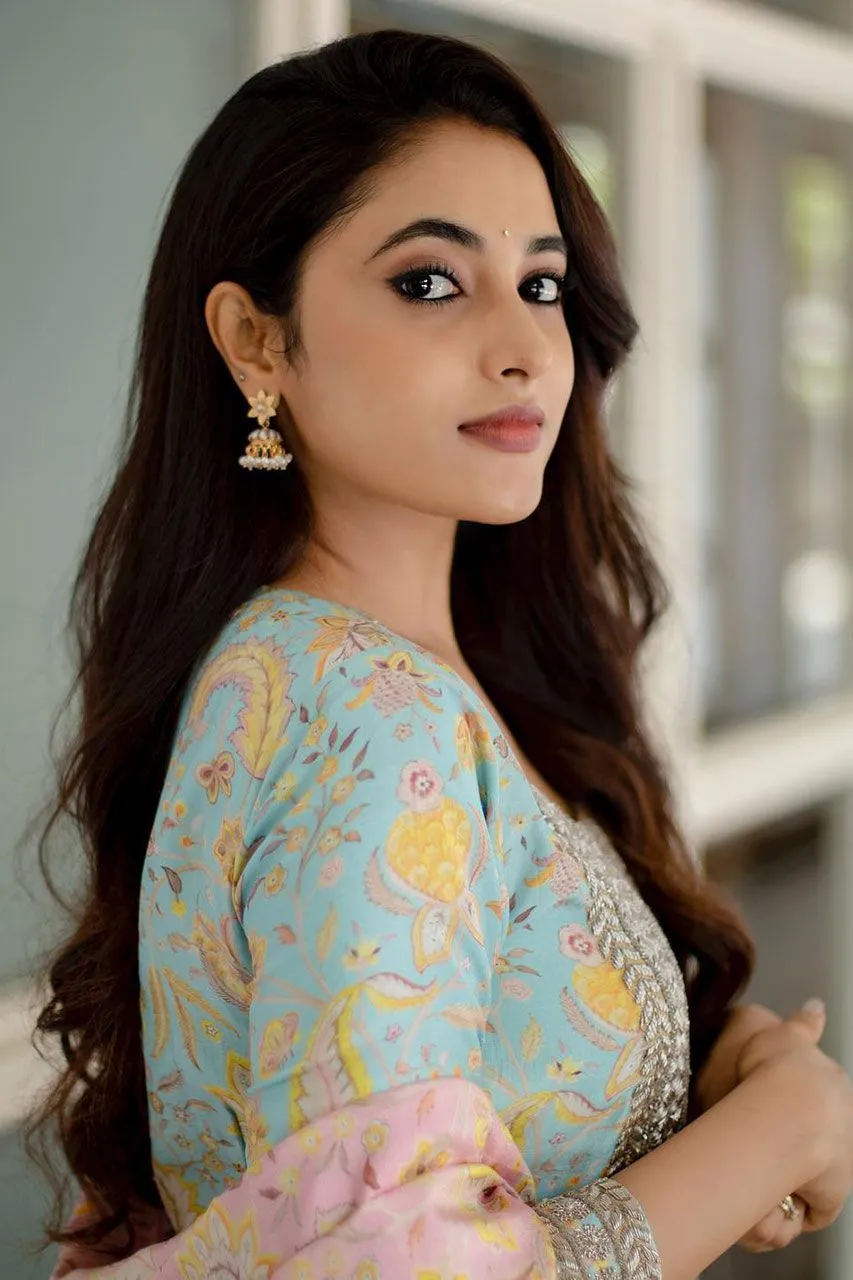 Beautiful Priyanka in pastel blue dress with soft lighting