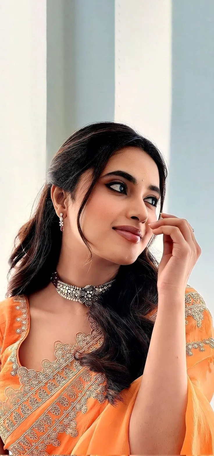 Charming Orange Saree Look by Priyanka Arul Mohan HD image